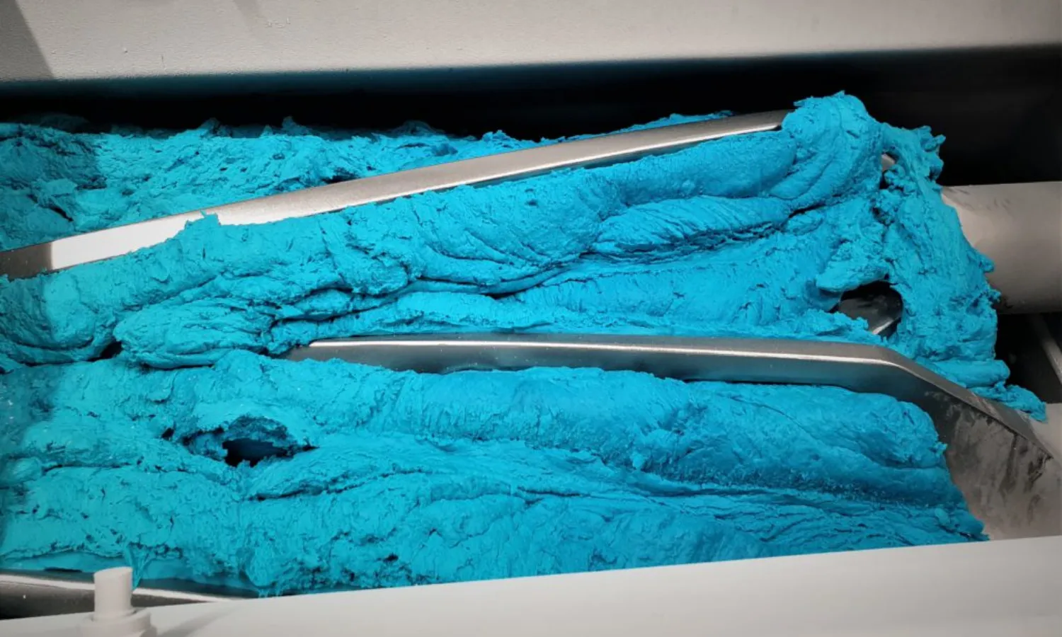 Showing liquid diffusion with colored dough for visual homogeneity test 